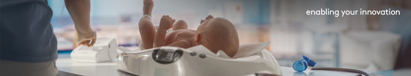 baby being weighed on scale