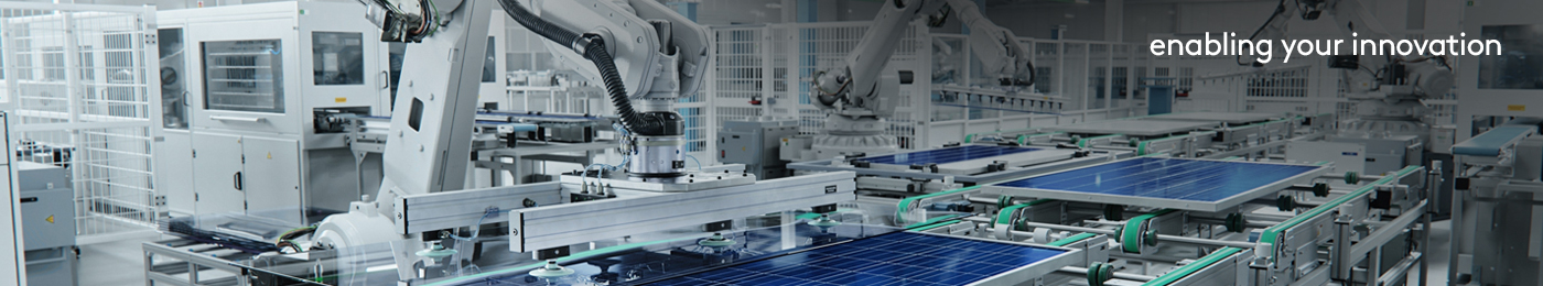 robotic arms on an assembly line