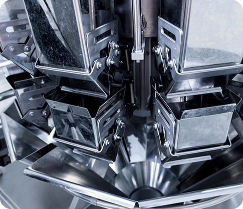Vertical multi-head weigher packaging machine snacks and chips in a factory