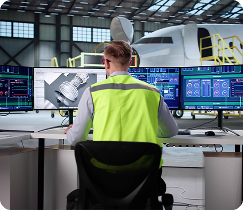 Engineer viewing computer program of the airplane