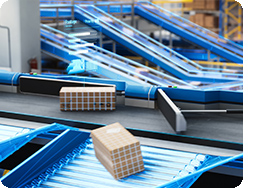 Parcels, Cardboard Boxes and Packages Lying on a Conveyor Belt