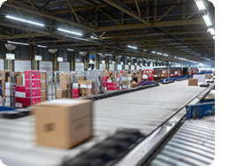 Package conveyor belt in warehouse